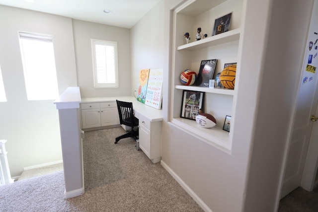 2143 Everglade Ave, Clovis, CA 93619 - office featuring light carpet, baseboards, and built in desk