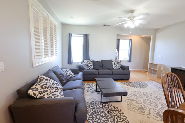 2143 Everglade Ave, Clovis, CA 93619 - living area featuring healthy amount of natural light, ceiling fan, and light wood-style floors