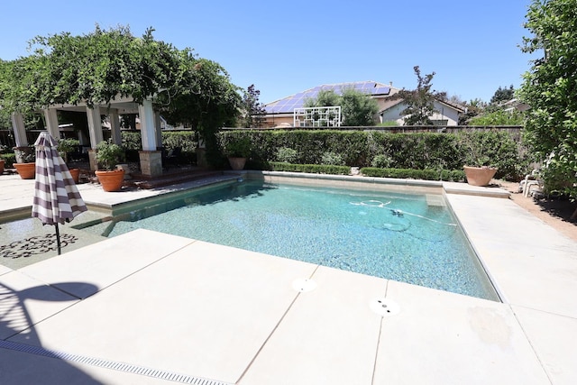 2143 Everglade Ave, Clovis, CA 93619 - view of swimming pool with a fenced backyard and a patio area