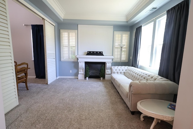2143 Everglade Ave, Clovis, CA 93619 - carpeted living room with ornamental molding, a raised ceiling, healthy amount of natural light, baseboards, and a fireplace