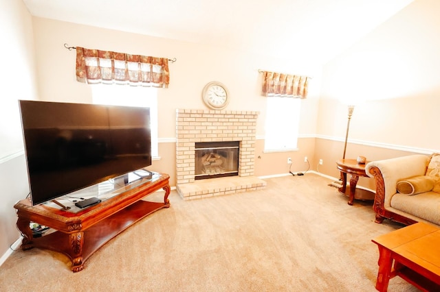 1866 E Goshen Ave, Fresno, CA 93720 - living room with a fireplace, carpet flooring, and baseboards