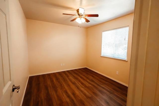 1866 E Goshen Ave, Fresno, CA 93720 - spare room with a ceiling fan, dark wood-type flooring, and baseboards