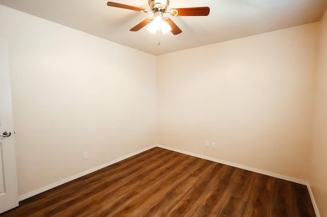 1866 E Goshen Ave, Fresno, CA 93720 - unfurnished room featuring baseboards, dark wood finished floors, and a ceiling fan