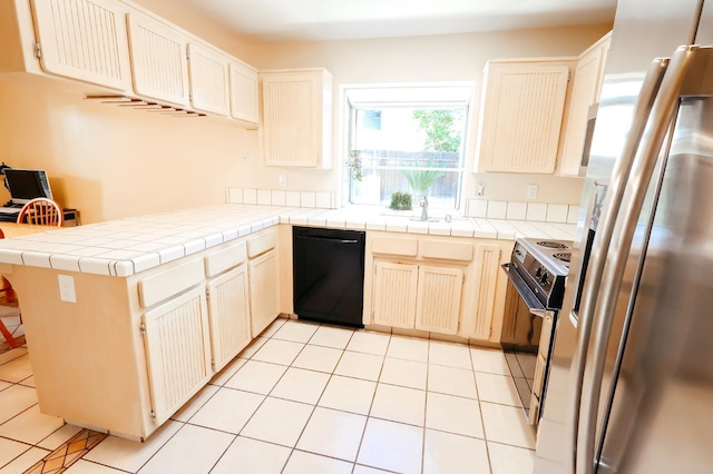 1866 E Goshen Ave, Fresno, CA 93720 - kitchen featuring freestanding refrigerator, dishwasher, electric stove, a peninsula, and a sink