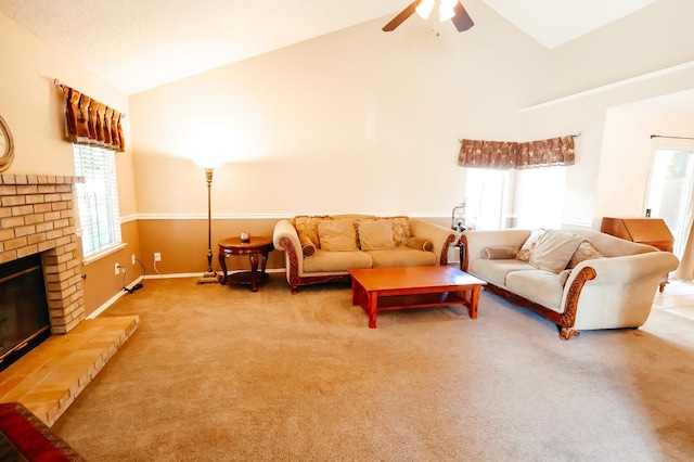 1866 E Goshen Ave, Fresno, CA 93720 - carpeted living area featuring a ceiling fan, a fireplace, baseboards, and high vaulted ceiling