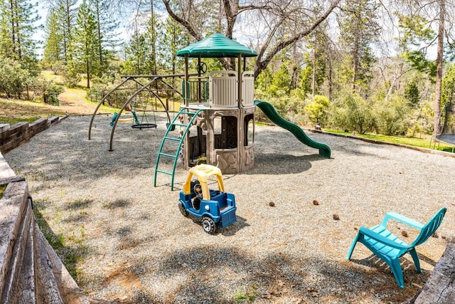 55606 Rd 226, North Fork, CA 93643 - community jungle gym with view of wooded area
