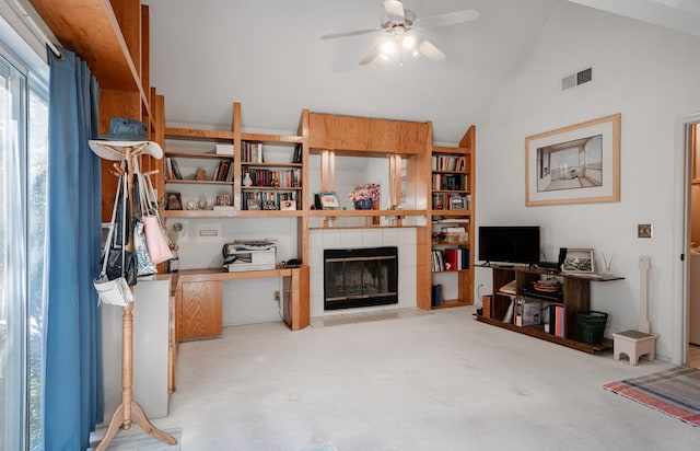 9109 N Chadwick Ln, Fresno, CA 93720 - carpeted living area featuring a ceiling fan, a fireplace, and high vaulted ceiling