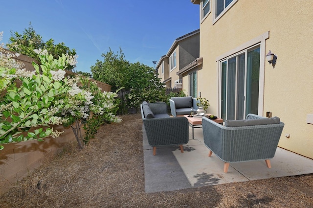 3368 Monterosa Ln, Clovis, CA 93619 - fenced backyard with an outdoor living space and a patio area