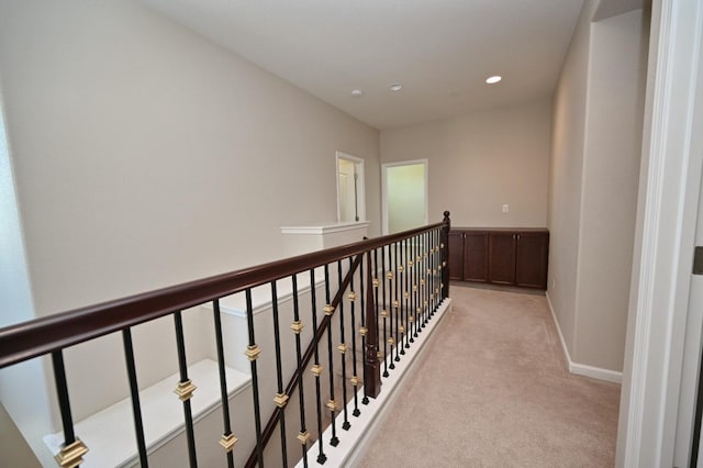 3368 Monterosa Ln, Clovis, CA 93619 - hallway with light colored carpet, an upstairs landing, recessed lighting, and baseboards