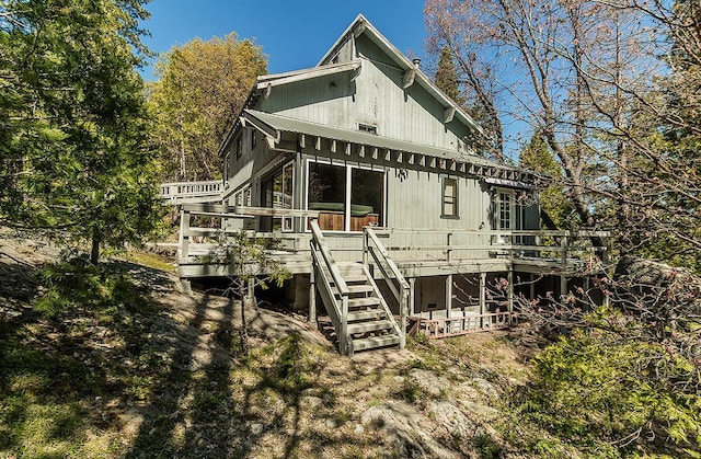 38830 Littlefield Rd, Shaver Lake, CA 93664 - rear view of house with stairway and a deck