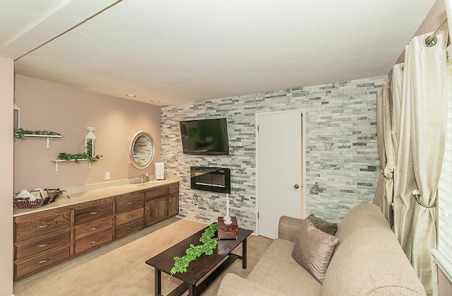 38830 Littlefield Rd, Shaver Lake, CA 93664 - living area with a fireplace and light colored carpet