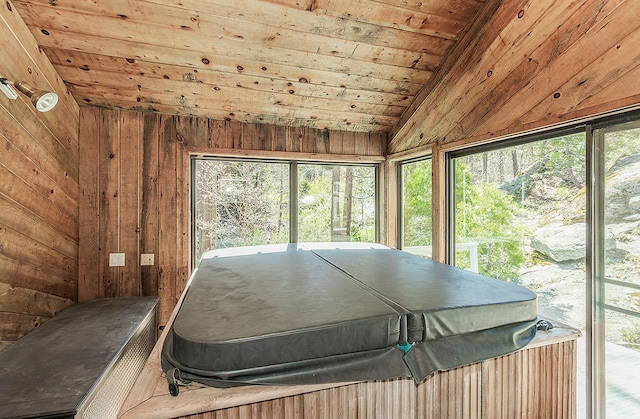 38830 Littlefield Rd, Shaver Lake, CA 93664 - sunroom / solarium featuring a hot tub, plenty of natural light, and vaulted ceiling