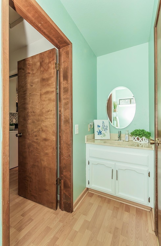 38830 Littlefield Rd, Shaver Lake, CA 93664 - bathroom with wood finished floors and vanity