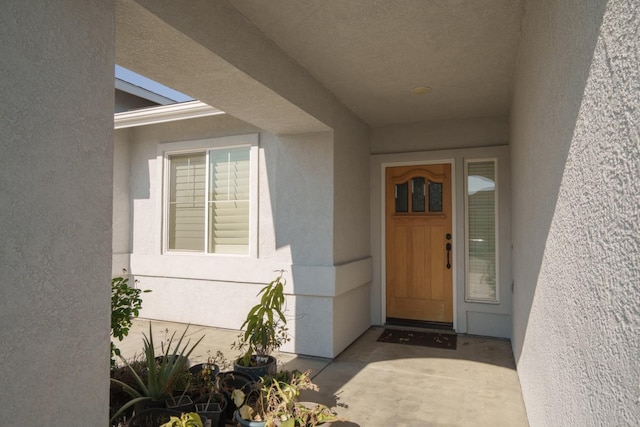 5138 W Beechwood Ave, Fresno, CA 93722 - property entrance with stucco siding