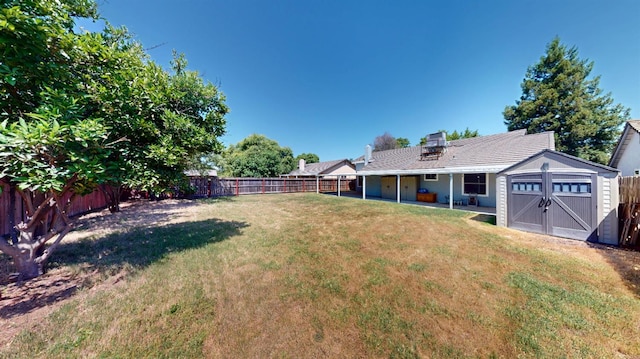 1604 W Central Ave, Madera, CA 93637 - fenced backyard with a storage shed and a patio
