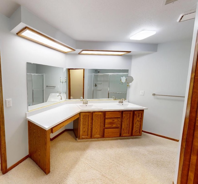 1604 W Central Ave, Madera, CA 93637 - full bathroom with a stall shower, double vanity, and carpet flooring