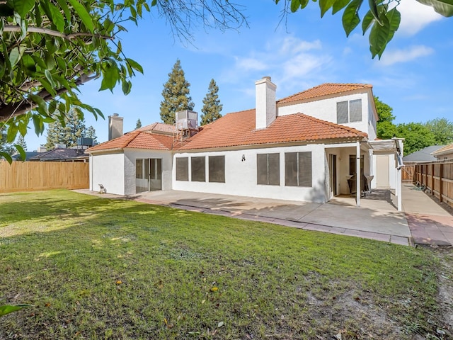 7549 N 8th, Fresno, CA 93720 - back of house featuring a tile roof, stucco siding, a patio area, and a chimney