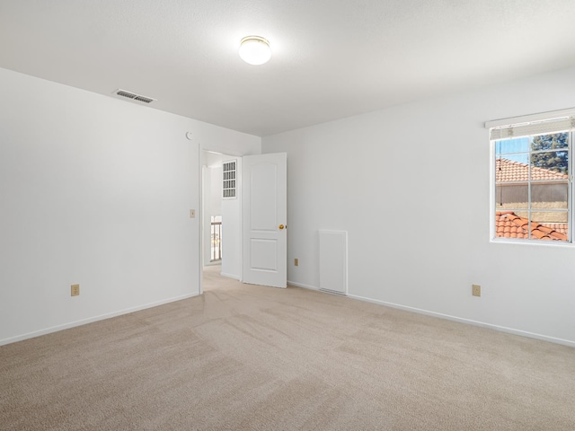 7549 N 8th, Fresno, CA 93720 - empty room featuring light colored carpet and baseboards