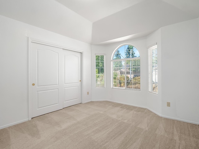 7549 N 8th, Fresno, CA 93720 - unfurnished bedroom with carpet, a closet, and baseboards