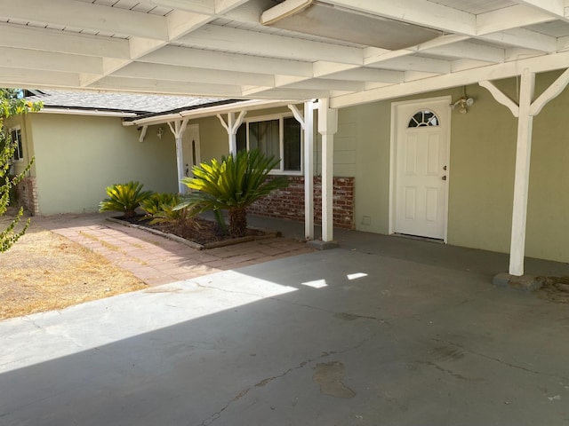 7371 N Highland, Clovis, CA 93619 - doorway to property with stucco siding