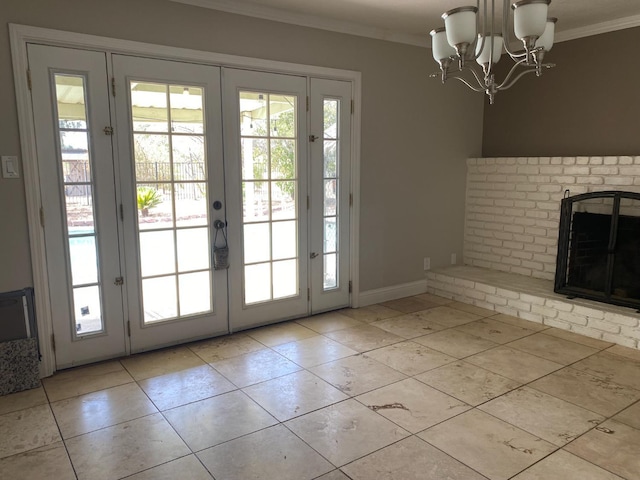 7371 N Highland, Clovis, CA 93619 - entryway with french doors, ornamental molding, a chandelier, and tile patterned flooring