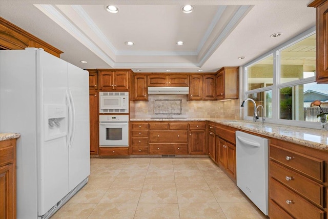 3595 W Magill Ave, Fresno, CA 93711 - kitchen featuring white appliances, under cabinet range hood, ornamental molding, a raised ceiling, and a sink