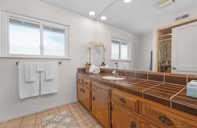3595 W Magill Ave, Fresno, CA 93711 - bathroom featuring vanity, a shower stall, tile patterned flooring, baseboards, and recessed lighting