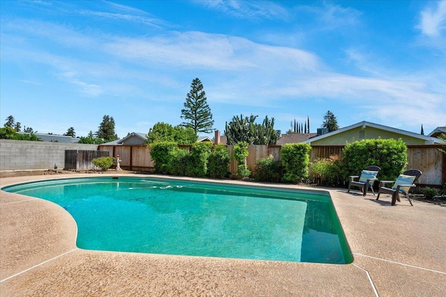 3595 W Magill Ave, Fresno, CA 93711 - view of swimming pool featuring a fenced backyard and a patio area