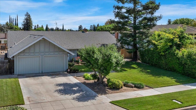 3595 W Magill Ave, Fresno, CA 93711 - view of front facade featuring board and batten siding, an attached garage, and concrete driveway