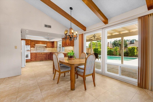 3595 W Magill Ave, Fresno, CA 93711 - dining space with a chandelier and light tile patterned floors