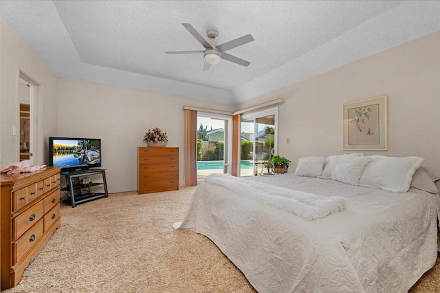 3595 W Magill Ave, Fresno, CA 93711 - carpeted bedroom featuring access to exterior, a textured ceiling, and ceiling fan