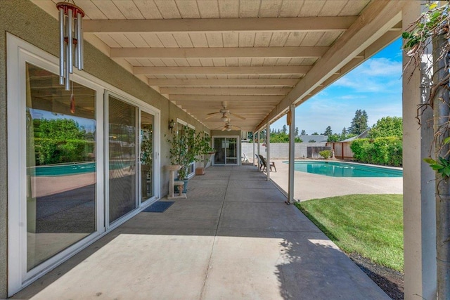 3595 W Magill Ave, Fresno, CA 93711 - fenced backyard with a patio and a ceiling fan