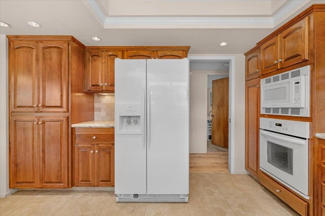 3595 W Magill Ave, Fresno, CA 93711 - kitchen featuring white appliances, recessed lighting, crown molding, brown cabinets, and light tile patterned flooring