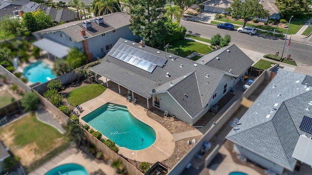 3595 W Magill Ave, Fresno, CA 93711 - aerial perspective of suburban area with a pool area