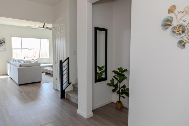 508 Laurel Crest Ave, Madera, CA 93636 - hall featuring wood finished floors, baseboards, and stairs