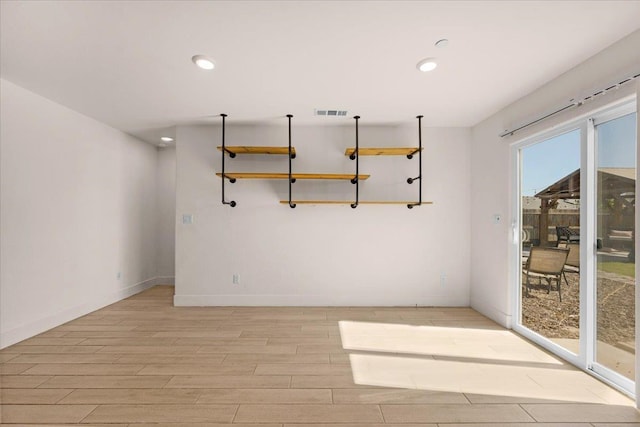 2520 S Spruce St, Visalia, CA 93292 - empty room featuring light wood finished floors, recessed lighting, and baseboards
