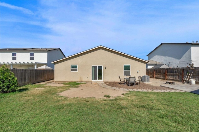 2520 S Spruce St, Visalia, CA 93292 - rear view of house featuring central air condition unit, stucco siding, and a patio area