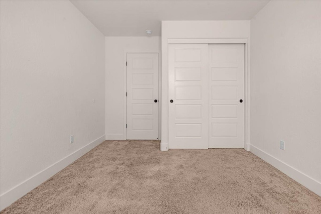 2520 S Spruce St, Visalia, CA 93292 - unfurnished bedroom with carpet floors, a closet, and baseboards