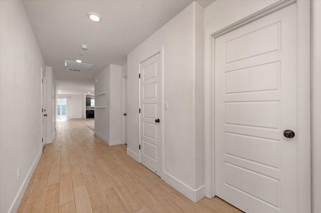 2520 S Spruce St, Visalia, CA 93292 - hall with baseboards, light wood-style flooring, and recessed lighting