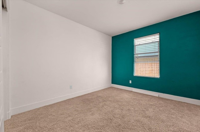 2520 S Spruce St, Visalia, CA 93292 - carpeted spare room featuring baseboards