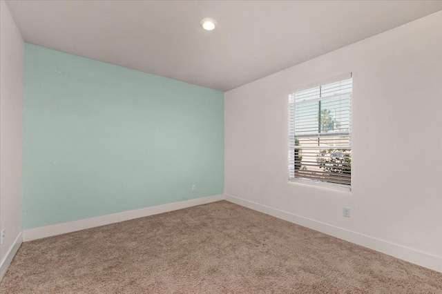 2520 S Spruce St, Visalia, CA 93292 - empty room featuring carpet, baseboards, and recessed lighting