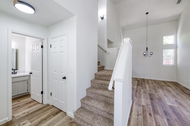 1892 E Goshen Ave, Fresno, CA 93720 - staircase with wood finished floors