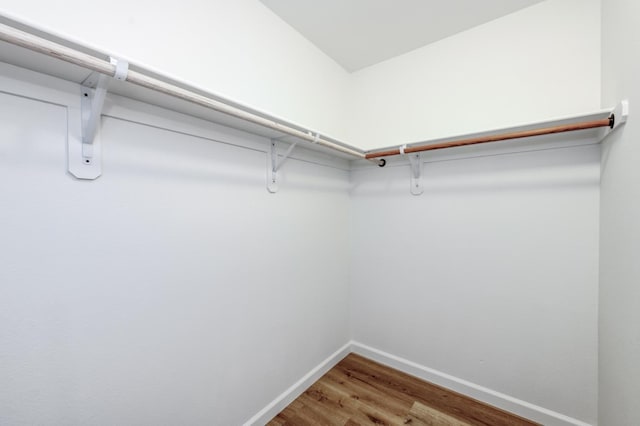 1892 E Goshen Ave, Fresno, CA 93720 - walk in closet featuring wood finished floors