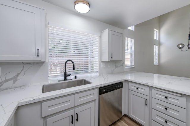 1892 E Goshen Ave, Fresno, CA 93720 - kitchen with dishwasher, a sink, tasteful backsplash, and healthy amount of natural light