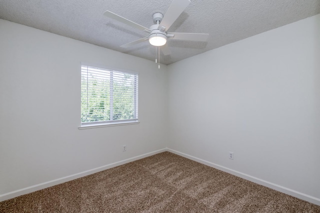 1892 E Goshen Ave, Fresno, CA 93720 - spare room featuring carpet flooring, a ceiling fan, baseboards, and a textured ceiling