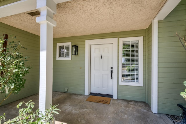 1892 E Goshen Ave, Fresno, CA 93720 - property entrance featuring stucco siding