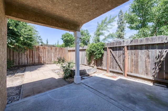 1892 E Goshen Ave, Fresno, CA 93720 - fenced backyard featuring a patio
