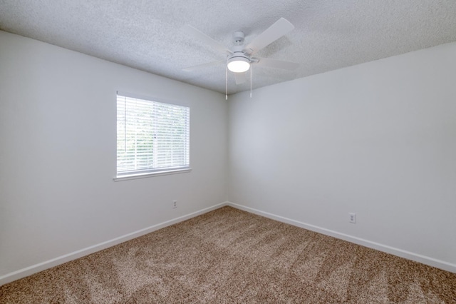 1892 E Goshen Ave, Fresno, CA 93720 - carpeted empty room featuring baseboards, ceiling fan, and a textured ceiling