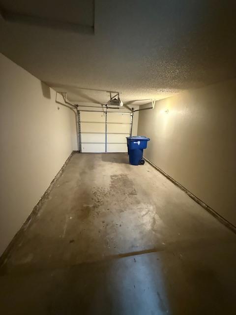 5749 N Monte Ave Unit 2, Fresno, CA 93711 - garage with a garage door opener
