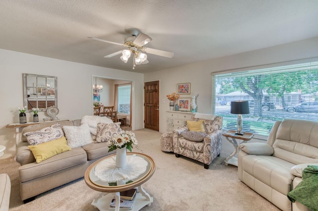 2934 N 8th St, Fresno, CA 93703 - carpeted living room featuring ceiling fan and a textured ceiling